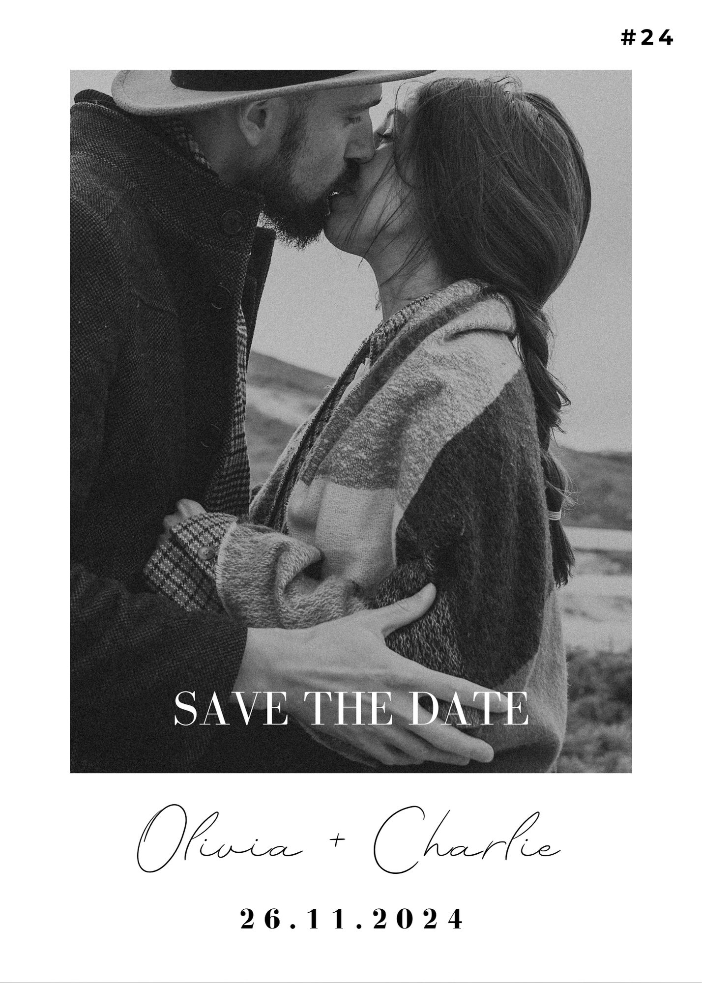 Romantic monochrome Save the Date card featuring Olivia and Charlie in a warm embrace