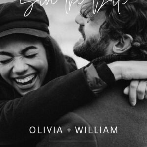 Joyful black and white Save the Date wedding card with a happy couple embracing